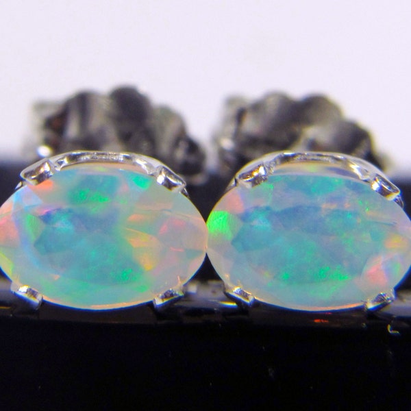 6x4mm Ethiopian Welo Opals, AAA+ grade Fiery Opals,  Oval Natural Ethiopian Opals, Sterling Silver Ear studs with excellent play of color.