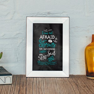 Quote ‘I am not afraid of storms for I am learning how to sail my boat’  Art Print - White and Aqua on Black Watercolour background