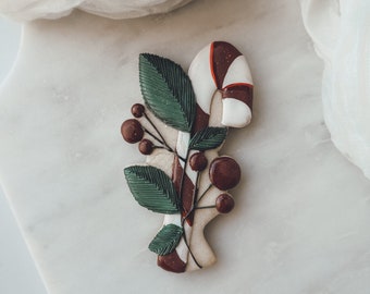 Cortador de biscoitos em forma de bengala doce com azevinho