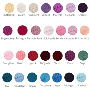 May include: A color chart of yarn with 24 different colors. The colors are arranged in three rows of eight. The colors are: Buttermilk, Cream, Parchment, Wisteria, Magenta, Clemantis, Emperor, Boysenberry, Pomegranite, Pale Rose, Soft Peach, Fondant, Powder Pink, Apricot, Candyfloss, Blush, Lipstick, Burgundy, Claret, Plum, Sage, Teal, Cloud Blue, Empire, Turquoise, Aster, Midnight, Sherbet.