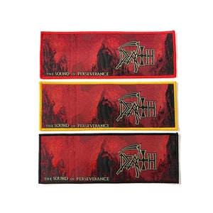 May include: Three rectangular patches with the word "DEATH" in a gothic font, featuring a grim reaper figure and the text "THE SOUND OF PERSEVERANCE." Each patch has a different border colour: red, yellow, and black. The background is a textured red.