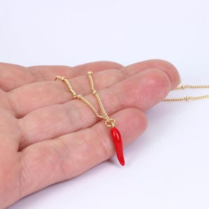 Red Enamel Lucky Horn Necklace: Gold Plated Charm, Adjustable, Handmade by Detail London.