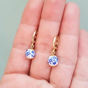 Blue & White Floral Ceramic Bead Charm Huggie Hoops, Choose 18K Gold Plated or Silver Plated, Handmade Hoop Earrings by Detail London.