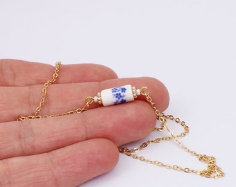 Vintage Style Ceramic Bead Charm Necklace, Dainty Ceramic Bead with Blue & White Delft Style Floral Design, Handmade by Detail London.