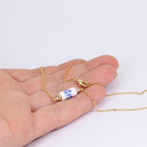Vintage Style Ceramic Bead Charm Necklace, Dainty Ceramic Bead with Blue & White Delft Style Floral Design, Handmade by Detail London.