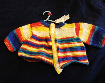 Summertime matinee jacket hand knitted to fit a child aged 0-3 months old