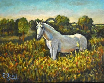 White Horse Amid Golden Grass