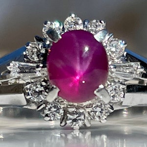 Natural Star Ruby Ring One Carat Star Ruby Platinum Diamond Halo Cabochon Cut Ruby. New never worn ring