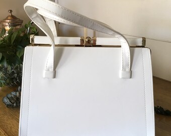 small white pocketbook