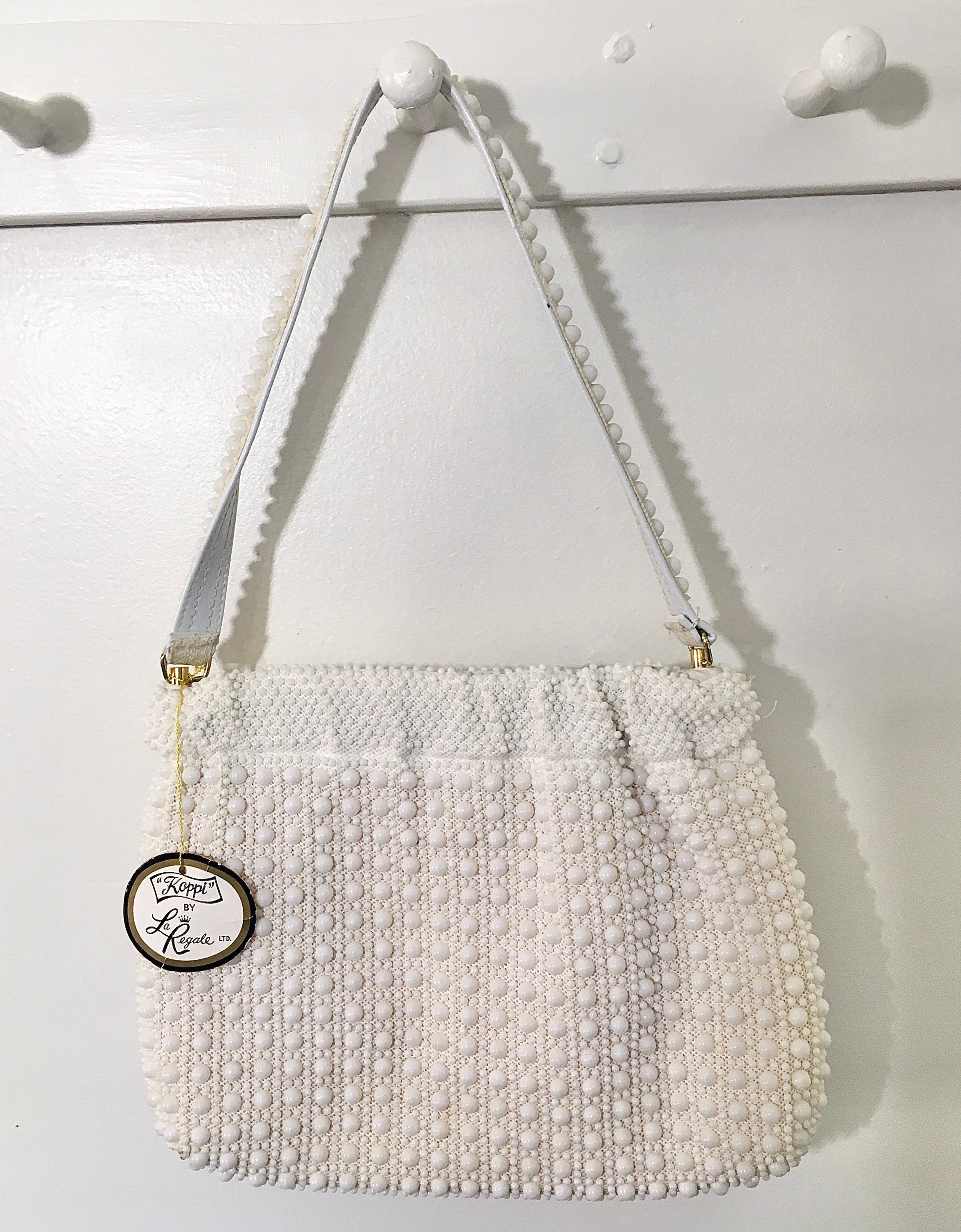 la regale white beaded purse