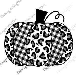 Puede incluir: Calabaza negra y blanca con un diseño a cuadros y de leopardo.