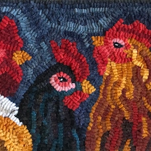 May include: A rug featuring a colourful design of four roosters. The roosters are in various shades of red, orange, yellow, brown, black, and blue. The background is a dark blue.