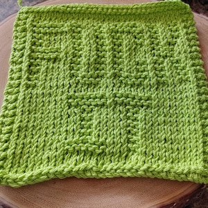 Peut inclure: Un torchon en tricot vert avec un motif texturé. Le torchon est fait de fil de coton et est parfait pour nettoyer la vaisselle et sécher les mains.