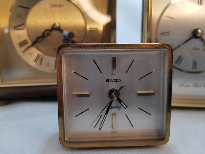 Wonderful set of three vintage brass clocks. All working order. Tempus Fugit, London Clock co., Swiza. image 3