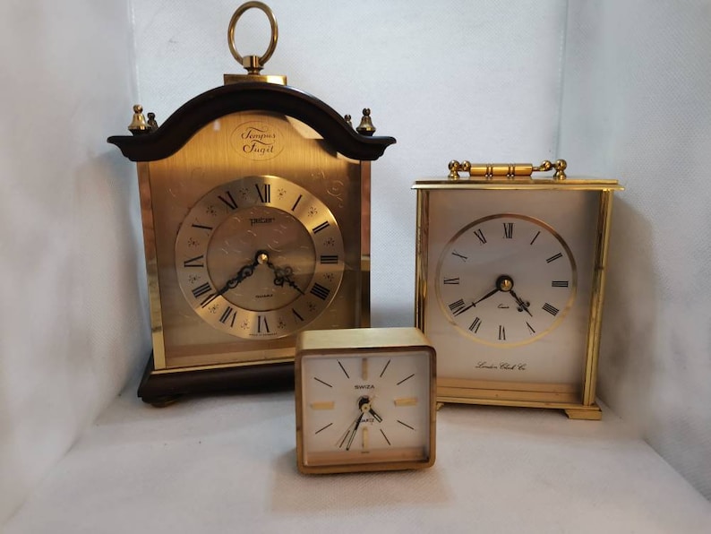 Wonderful set of three vintage brass clocks. All working order. Tempus Fugit, London Clock co., Swiza. image 2