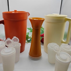 Lovely selection of vintage Tupperware and plastic storage containers. 1970s.