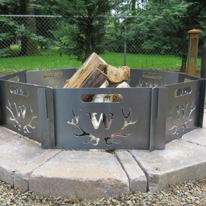 FIRE PIT PERSONALIZED, custom and portable. Add your initial into the crest of elk antlers and make this a unique and one of a kind gift.