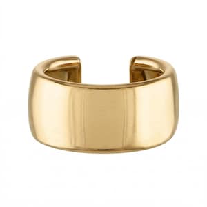 May include: A gold-colored ear cuff with a smooth, polished surface. The cuff has a rounded, rectangular shape with an opening at the top. The jewelry is designed to be worn on the ear.