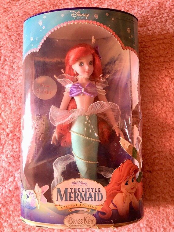 the little mermaid special edition brass key porcelain doll