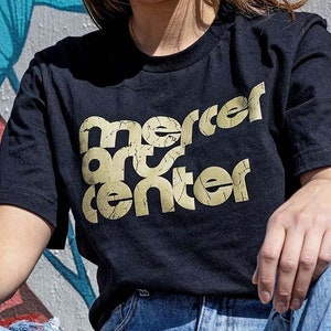 Camiseta unisex de manga corta del Mercer Arts Center de Nueva York - Retro Rock Tees