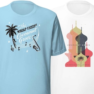 May include: Two t-shirts. One is light blue with a black graphic of a palm tree, musical notes, and a saxophone, with the text "The World Famous Cocoanut Grove". The other is white with a colorful graphic of domes and a palm tree, with the text "Cocoanut Grove".