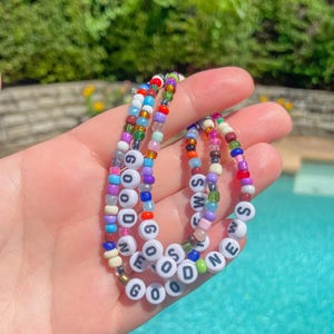 rainbow beaded “good news” faith stretch bracelet