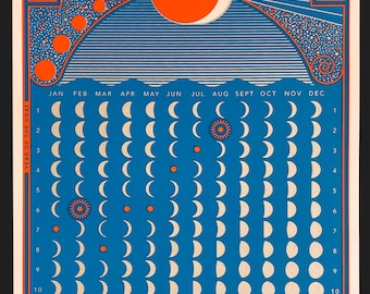 May include: A 2027 wall calendar featuring a blue background with orange and white moon phase illustrations. The top displays the text TWO THOUSAND TWENTY SEVEN. The grid shows months and days with lunar cycles, sun icons, and the text YEAR OF THE GOAT.