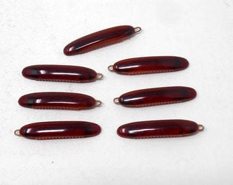 Fantastische vintage set van 7 haarkammen uit 1970 met een gesneden frame, gemaakt in Frankrijk. Zeldzaam.