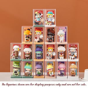 May include: A display of Molly figurines in clear cases. Each figurine has a distinct design, with different outfits and accessories. The text at the bottom states: "The figurines shown are for display purposes only and are not for sale."