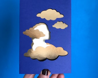 original greeting card clouds gold and blue