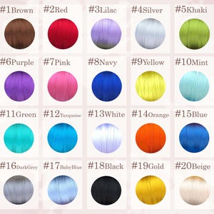May include: A color chart featuring twenty numbered circular swatches of thread. The colors include brown, red, lilac, silver, khaki, purple, pink, navy, yellow, mint, green, turquoise, white, orange, blue, dark grey, baby blue, black, gold, and beige.