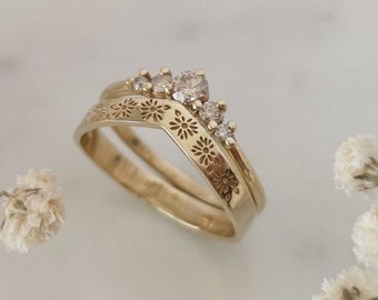 Wedding ring set, 14k flower band paired with a champagne diamond ring.