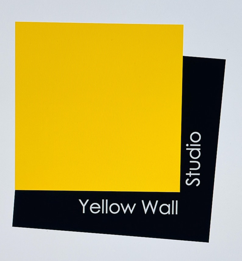 May include: A graphic design featuring a bright yellow square overlapping a black rectangle. The text "Yellow Wall" is displayed in white at the bottom, with "Studio" in white text on the side.