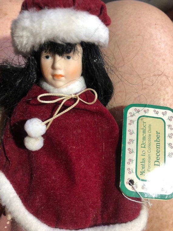 months to remember porcelain collectible dolls