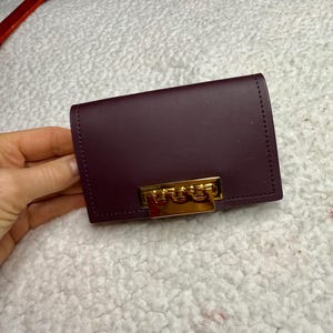 Cartera con tarjetero, accesorio tipo cartera de Zac Posen, minicartera de mano
