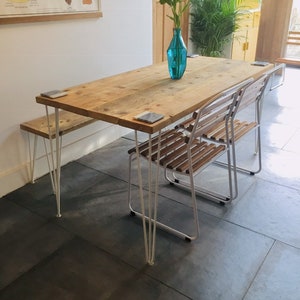 Reclaimed wood dining table and bench hairpin