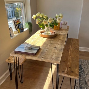 Reclaimed wood dining table and bench with steel hairpin legs