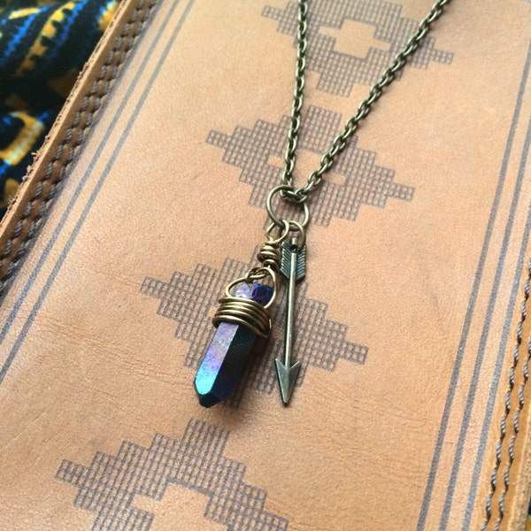 Auras & Arrows // A titanium aura quartz point wrapped in antiqued-gold wire and paired with a dainty arrow charm