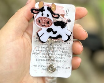 Jumping cow badge reel