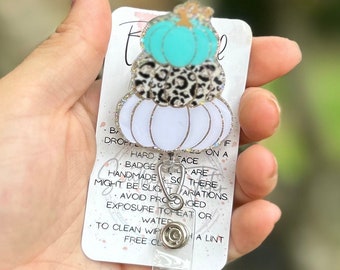Stacked pumpkins badge reel