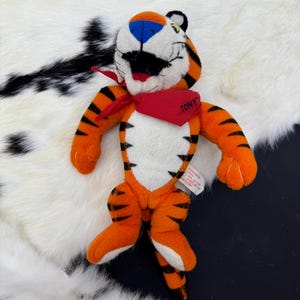 1997 Kelloggs Tony the Tiger Frosted Flakes jointed plush collectible cereal 90s toy y2k stuffed animal