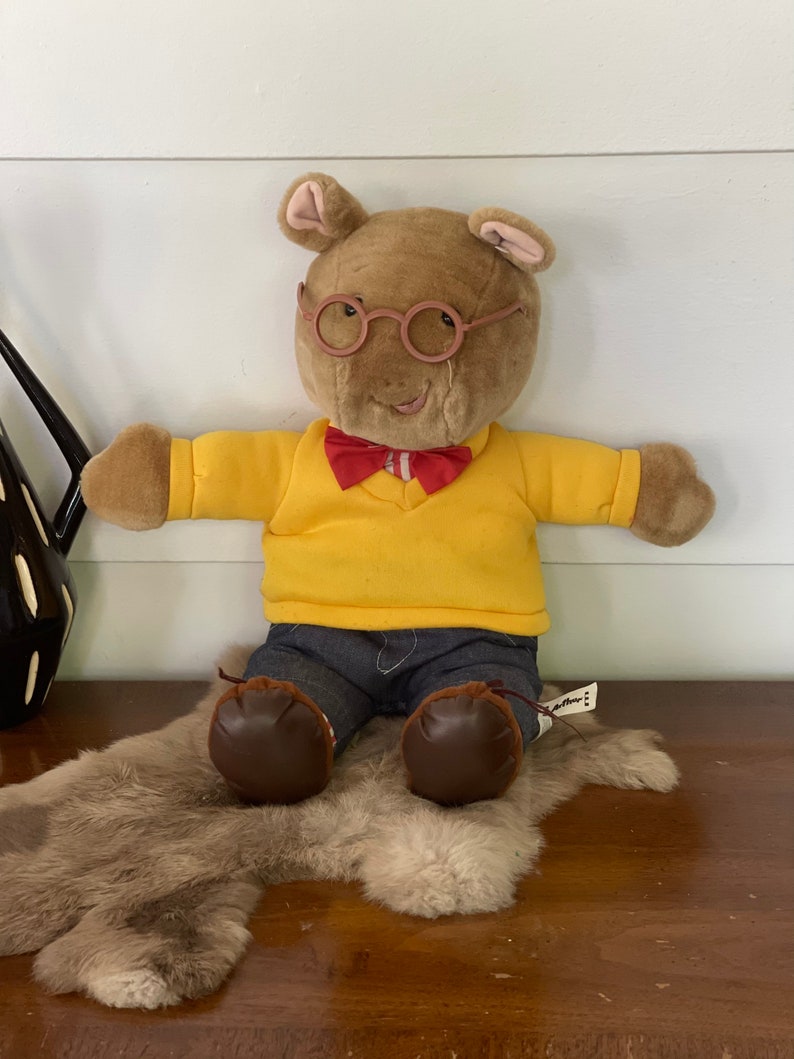 arthur yellow sweater