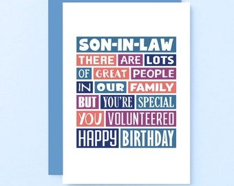 May include: A birthday card with the text "Son-in-Law There are lots of great people in our family but you're special you volunteered Happy Birthday" in colorful blocks.