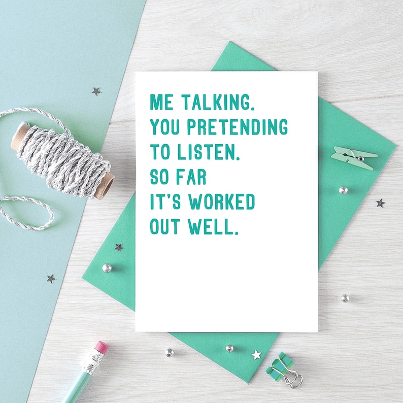 Witty Love Card with the text Me talking. You pretending to listen. So far it's worked out well. Shown with a turquoise envelope. Designed by SixElevenCreations.