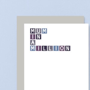May include: A white card with the words "MUM IN A MILLION" spelled out in colorful blocks.