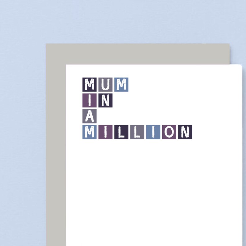 May include: A white card with the words "MUM IN A MILLION" spelled out in colorful blocks.