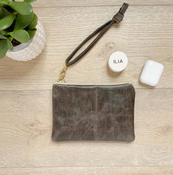 gray leather wristlet