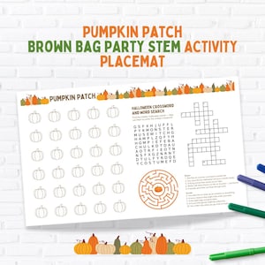 May include: A white placemat with the text "PUMPKIN PATCH BROWN BAG PARTY STEM ACTIVITY PLACEMAT". The placemat features pumpkin outlines, a Halloween crossword, and a maze. Colored markers are in the corner.