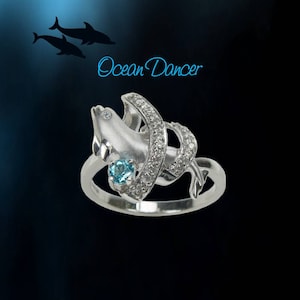 Sterling Silver Dolphin Ring: Ocean Blue Topaz & Diamond Accent