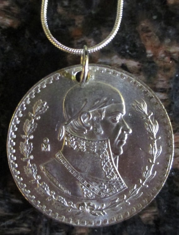 -/> JOSE MORELOS! SILVER MEXICO UN PESO COIN IN CAPSULE BRILLIANT UNC